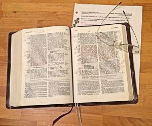 Bible, glasses, notes for 6-8-15 on wood